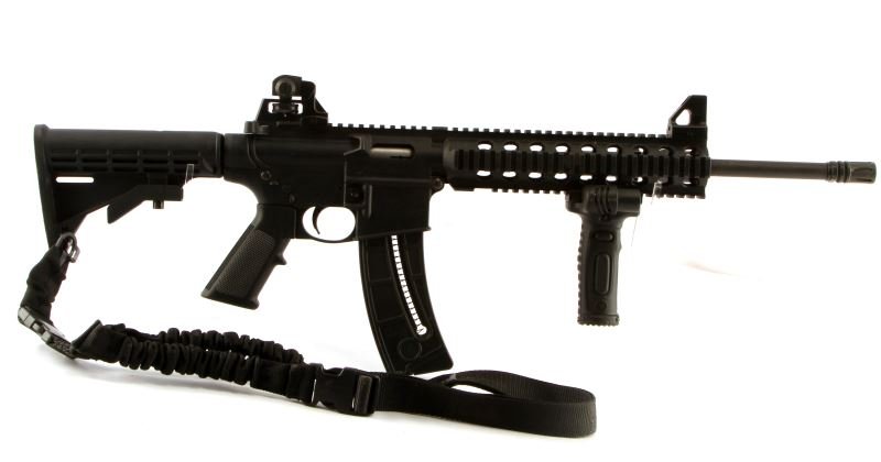 SMITH AND WESSON MODEL 15-22 22LR: Includes flashlight, laser pointer fore grip, and 1 magazine. Light wear present to rifle; overall in very good condition. This firearm requires an FFL transfer upon purchase.