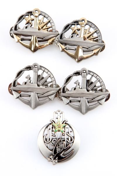 GROUP OF 5 FRENCH FOREIGN LEGION BADGES: Each badge is marked "Artus-Bertrand" on the back. Light wear present; overall in very good condition. Unauthenticated as is.