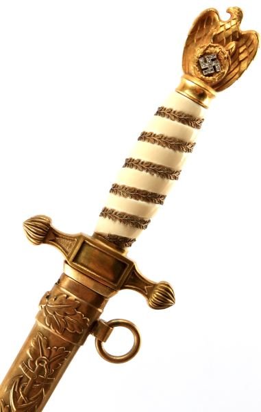 WWII THIRD REICH KRIEGSMARINE HONOR DAGGER: A Kriegsmarine honor dagger made from correct period parts purchased from German edged weapons authority Thomas Johnson. The dagger's current owner purchased the diamond encrusted pommel in 1988/1989