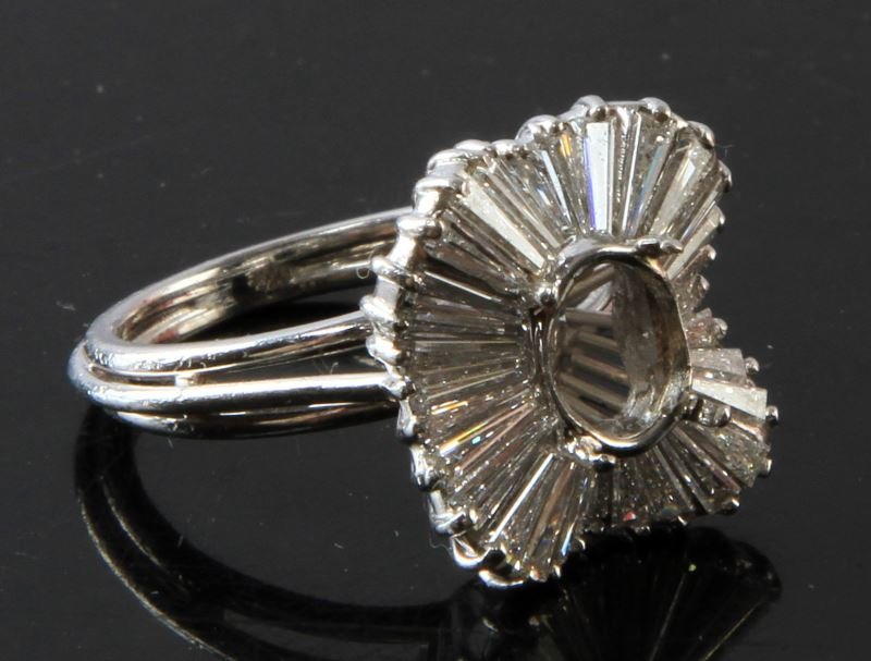 LADIES VINTAGE PLATINUM RING (SEMI-MOUNT) 2.49CTW: 1970's platinum semi-mount ring, no center stone, containing 32 tapered baguette cut diamonds, with an approximate total diamond weight of 2.49 carats, graded E-G/ VVS1-VS1. Beautiful piece. This lot