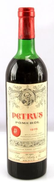 1975 PETRUS POMEROL METROL RED WINE MERLOT: Vintage 1975 Petrus Pomerol Merlot red wine. Label and seal still present. Top shoulder ullage. Cherry red color. The label is in very good condition . Tight sealed cork. 730 mL.