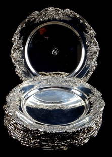 12 ANTIQUE REED & BARTON FRANCIS I STERLING PLATES: One dozen duplicate plates, with hand engraved monogram. Made by Reed and Barton in 1931, Francis I pattern, sterling silver, hand chased charging plates, 10 1/2 inches in diameter, in very good condi