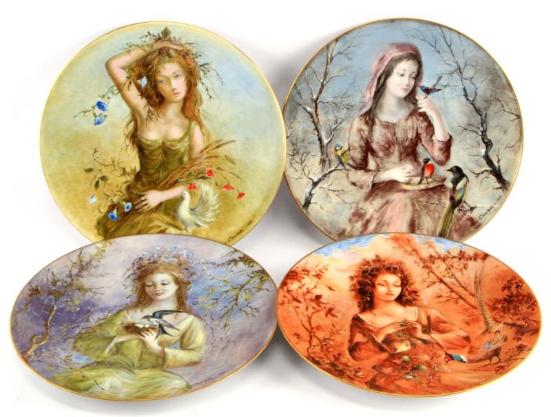 4 VINTAGE GUY CAMBIER LIMOGES PORCELAIN PLATES: In very good condition, depicting the "Four Seasons", four 9 3/4 inch porcelain plates, by artist Guy Cambier, produced by Limoges. Late 1970's early 1980's.