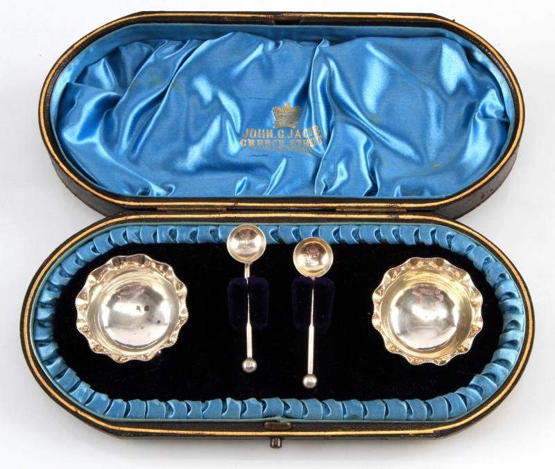 1891 HALLMARK STERLING SILVER SALT SET: Birmingham hallmark silver, in original Victorian box. John J. Jacob, Liverpool. two salts and two spoons.