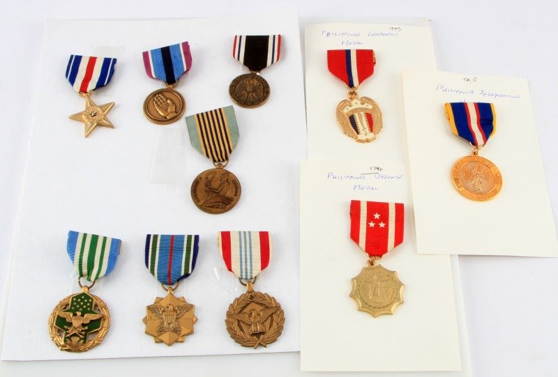 WWII U.S MEDAL LOT OF 10 DIFFERENT ISSUES: Post war manufacturer, but WWII period medals, includes silver star, Philippines, liberation, defense, and independence, also achievements and commendations.
