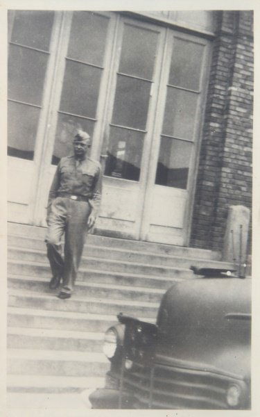 EISENHOWER PHOTO AFTER SIGNING GERMAN SURRENDER: An original 5.5 by 3.5 photograph of Eisenhower taken by Dominick A. Peronti,a 5th grade technician of the 391st artillery battalion while he was stationed in Reims in 1945. The back reads "General Ei