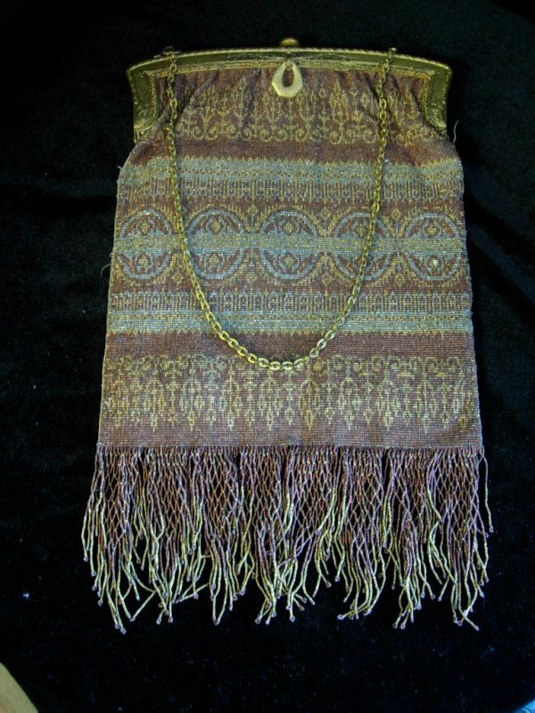 ANTIQUE STEEL BEAD FRENCH HANDBAG PURSE LARGE EARL: ANTIQUE STEEL BEAD FRENCH HANDBAG PURSE LARGE EARLY GOLD RUST SILVER STEEL BEAD HANDBAG W GOLD METAL FRAME CLOTH LINED W POCKETS AND BEAUTIFUL FRINGE 11'H 7"W