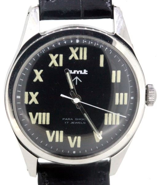 VINTAGE MENS WATCH "HMT" BROAD ARROW MILITARY: Indian Broad Arrow watch. Steel case, black dial with Roman numerals (refinished and new luminous material added), manufactured by HMT. Hindustan Machine Tools was incorporated in 1953 by the Governme