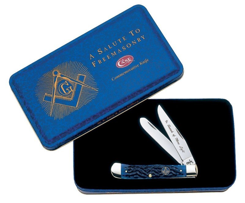 CASE XX MASONIC BLUE BONE TRAPPER PCKTKNIFE W/ TIN: Item is unopened in collectable gift tin. Knife features standard jigged blue bone handle featuring Masonic shield, with Stainless steel Clip and Spey blades embellished with words, "In Search of More
