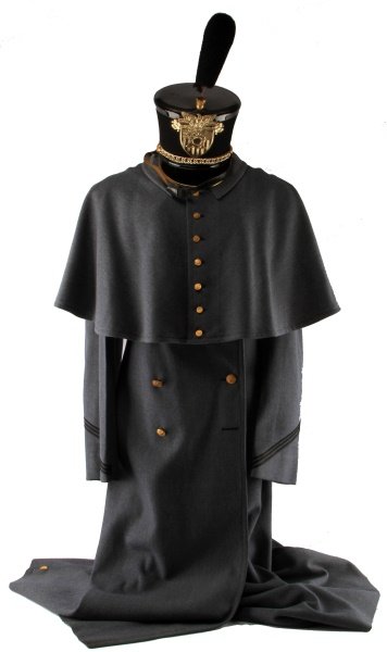1944 WEST POINT CADET UNIFORM W/ CAPE & TARBUCKET: A 1944 West Pint cadet's uniform with cape and tar bucket shako hat. The coat is labeled with a West Point cadet store tag. Larger size. In very good condition with one missing button on the lower por