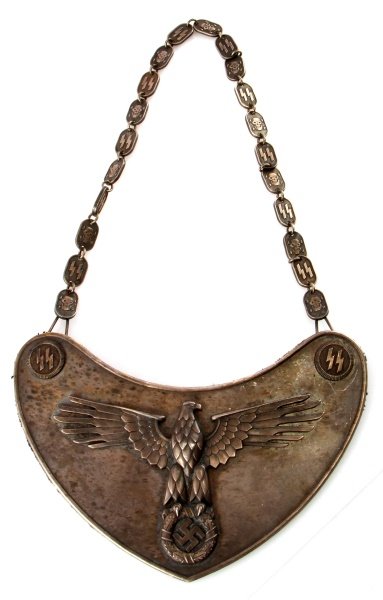 WWII GERMAN SS STANDARD BEARERS GORGET W CHAIN: WWII German SS Standard bearer gorget shield with chain. Black felt back. RZM stamped "M1/128". The gorget measures 8 inches wide by 5.25 inches tall. The chain measures 20 inches long. Unauthenticate