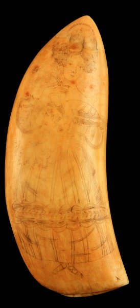 ANTIQUE SCRIMSHAW WHALE TOOTH CARVING 6.25 INCHES: Pre-ban whale tooth scrimshaw depicting a woman on one side and a bird on the other. The piece has a few age cracks along the body. This work is unsigned. Overall good condition for its age. Measures 