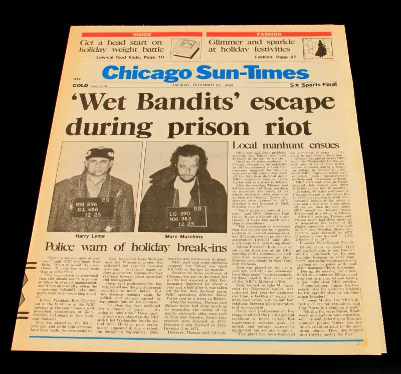 AUTHENTIC HOME ALONE 2 1992 PROP NEWSPAPER: Mock Chicago Sun-Times Newspaper, dated Tuesday, December 23rd, 1992, titled "Wet Bandits escape during prison riot." This is the actual prop newspaper used in the very popular sequel, "Home Alone 2."
