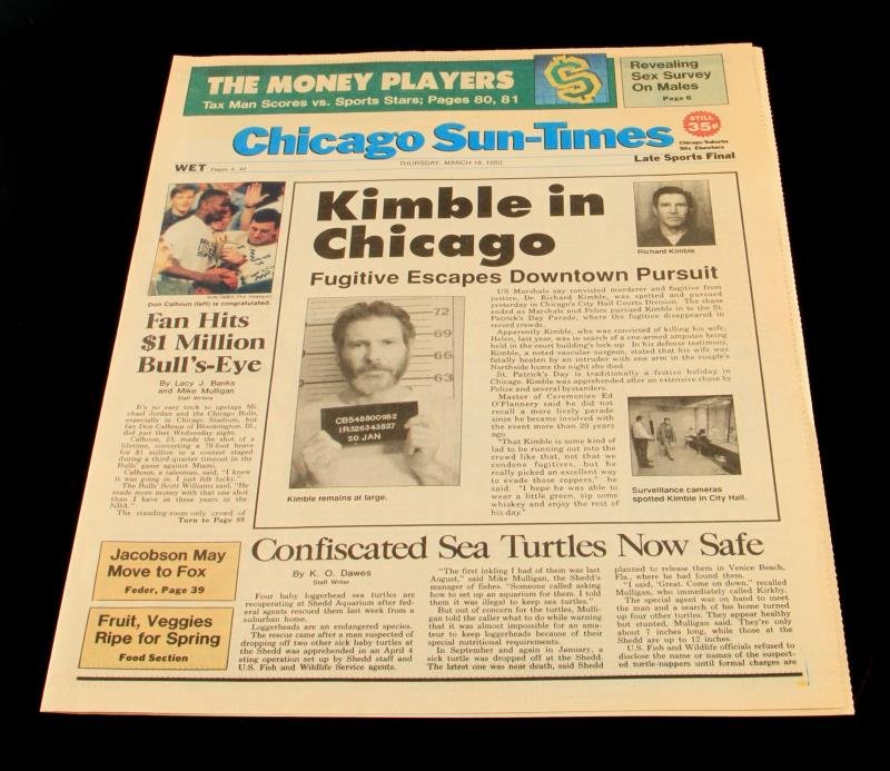 AUTHENTIC "THE FUGITIVE" 1993 MOVIE PROP NEWSPAPER: Mock Chicago Sun-Times Newspaper dated Thursday, March 18, 1993, with headline reading "Kimble in Chicago." This is an authentic mock newspaper prop used in the 1993 film "The Fugitive," featuring Har