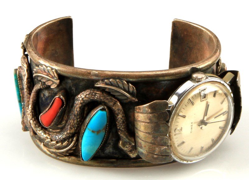 SIGNED NATIVE AMERICAN WATCH CUFF W TIMEX: Vintage pawn shop Native American signed sterling silver, turquoise, and coral watch cuff. Signed "RG", possibly Raymond Gasper. Includes vintage Timex watch, running but no implied warranty. The cuff