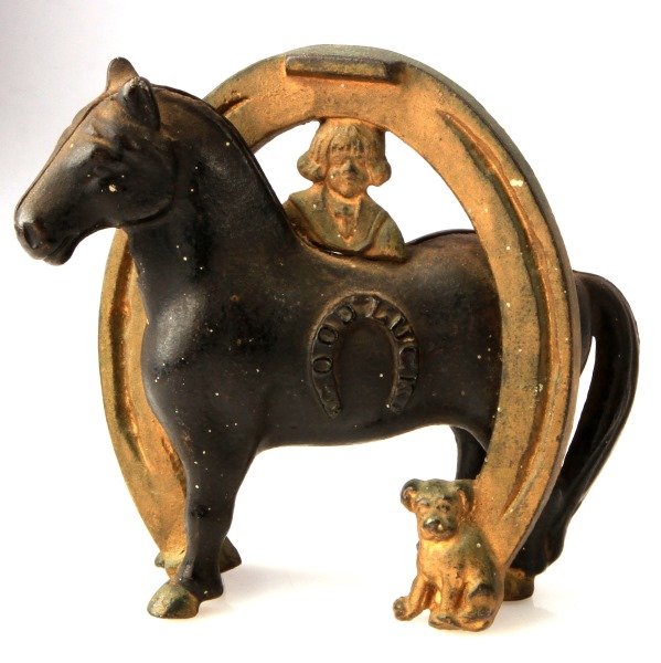 ANTIQUE CAST IRON BUSTER BROWN TIGE GOOD LUCK BANK: Vintage Buster Brown & Tige cast iron "Good Luck" coin bank. These banks were made by the Arcade Toy Co. from 1908 through 1932, used as advertisement for the Buster Brown shoe company. Item is in gre