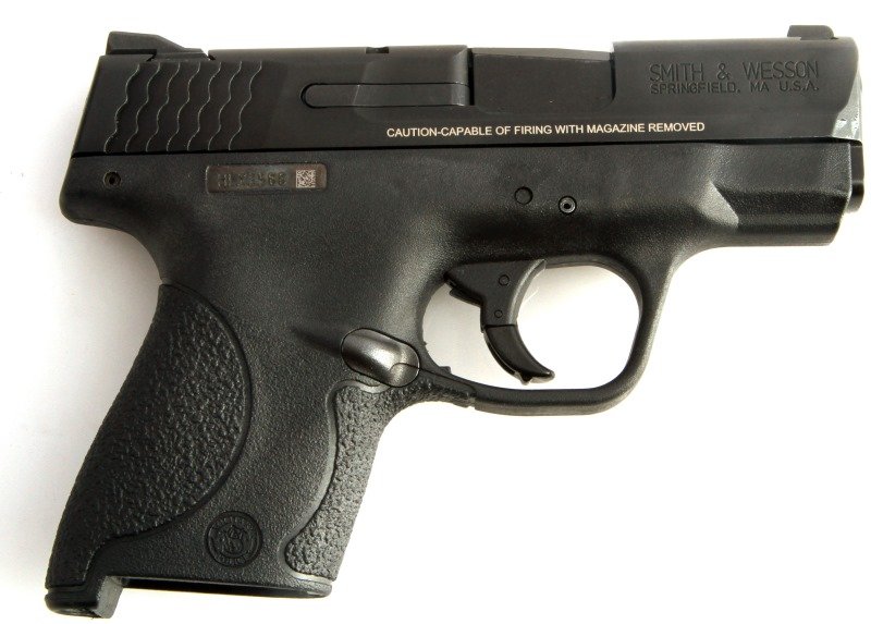 SMITH & WESSON M&P 40 SHIELD SEMI AUTO PISTOL: Smith & Wesson M&P 40 Shield handgun. All black steel and polymer. Serial no. HLX3588 to right side. Bore is good. Comes with 2 clips, lock, and original box. Very good condition. Requires FFL for tra