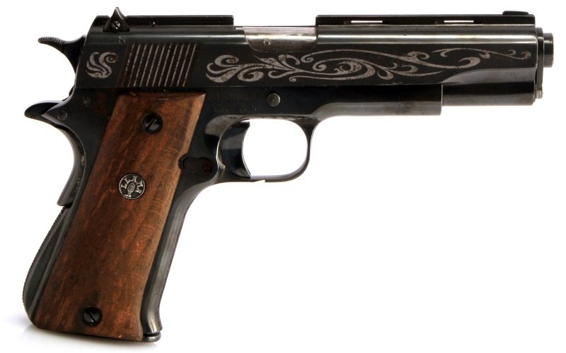 STOEGER LLAMA .45 CAL SEMI AUTO PISTOL WITH INLAY: Stoeger Industries Llama semi-automatic pistol in .45 caliber. Made in Spain. Steel scroll inlay to both sides of slide. Proof marks to left side frame. Serial no. 767560 to right side. Little rust to