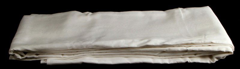 VINTAGE US NAVY BANQUET TABLECLOTH 72 X 172 INCHES: Vintage US Navy banquet tablecloth in seemingly unused condition. The white table cloth is free from stains, holes, tears, or mothing. Measures 72 by 172 inches.