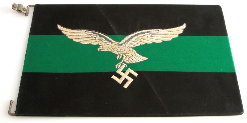 WWII GERMAN LUFTWAFFE LIGHT INFANTRY COMMAND FLAG: Post-1942 WWII German Third Reich Luftwaffe non-motorized rifle and mountain infantry flag with partial mounts still attached. The flag has a small hole in the green field, and a few small imperfectio