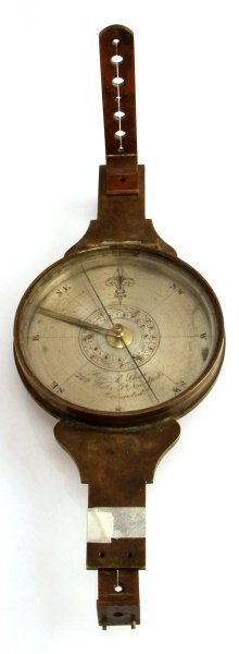 19TH CENTURY FRYE & SHAW SURVEY COMPASS: Circa 1840 Frye & Shaw 222 Water Street, New York, Warranted. Five inch diameter engraved silvered dial, needle dial engraved to 90 degrees. Compass points north when released. It has both mounting br