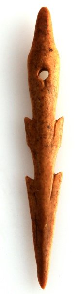 N. AMERICAN BARBED FISHING SPEAR TIP MADE OF BONE: A Native American fishing barbed fishing spear tip crafted out bone. Measures 4 1/8 inches long. Has two sets of barbs on each side plus a perforation near the base. In very good condition with no chi