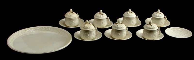 MOTTAHEDEH CUP & SAUCERS POT DE CREME ITALY LOT 7: Vintage Mottahedeh Pot De Creme ceramic lot of 7 with extra saucer and serving platter. Strawberry floral design in relief, all white. Made in Italy stamped to bottom. Very good condition with no chip