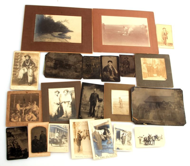 CDV TINTYPE PHOTOGRAPH LOT COWBOY HUNTING FISHING: 20 Different photographs and includes, tintype of man wearing Indian blanket, CDV of trapper with rifle and game, tintype of farm family with two men holding "Fiddles", woman in front Niagara falls sc
