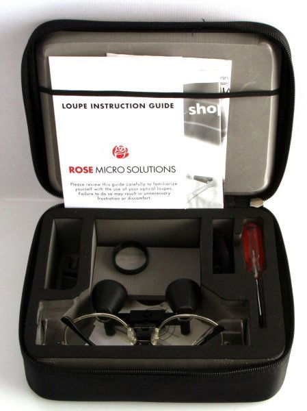2X MICRO-LOUPE ON TITANIUM FRAMES ROSE SOLUTIONS: Carrying case included, Micro-loupe on frames you wear as a pair of glasses. 2x power, made by Rose solutions.