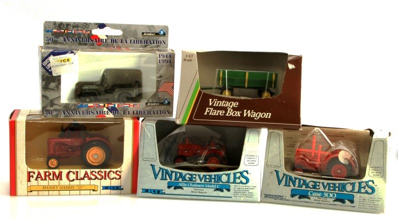 GROUP OF 5 VINTAGE DIE-CAST REPLICA FARM VEHICLES: Lot of 5 vintage die-cast 1/43 scale replica farm vehicles including; Farm Classics Massey Harris "55'', Vintage Vehicles Allis Chalmers Model C, Vintage Flare Box wagon, Vintage vehicles Case 500, an