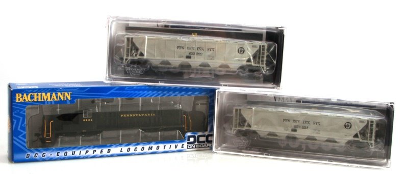 LOT OF 3 MODEL TRAINS BROADWAY LIMITED & BACHMANN: Lot of three model trainsincluding; 2 brand new unused HO scale H32 Covered Hoppper PRR Gray w/ "Pennsylvania" & black circle keystone, 1 DCC- equipped locomotive 8604 "Pennsylvania" die cast. All ite