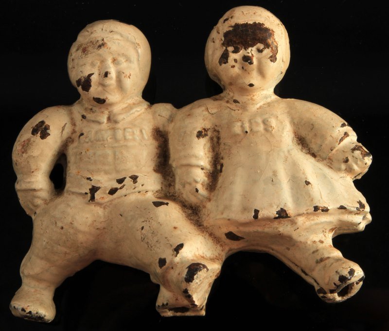CAMPBELL KIDS CAST IRON STILL BANK PAINTED: All original A. C. Williams "Campbell Kids" cast iron bank made in the early 1900s, used as a promotional toy for Campbell soup. The item is in good vintage condition, with small chips on the paint an