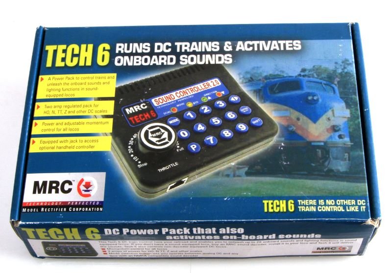 MRC TECH 6 LOCOMOTIVE SOUND CONTROLLER 2.0: MRC TECH 6 sound controller 2.0 for locomotives, like new in original box. This item allows one to control their trains and unleash onboard sounds and lighting functions in certain locomotives.This lo