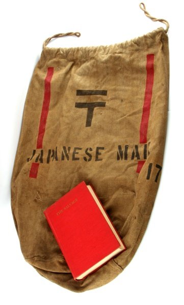 WWII JAPANESE INTERNMENT CAMP MAIL BAG W/ BOOK: US Japanese World War II Internment Camp Mail Bag. Measures 22 1/2" wide by 34 3/4" tall. The front reads ‘Japanese Mail’ with a ‘T’ above. Brown canvas machine sewn construction. Included is