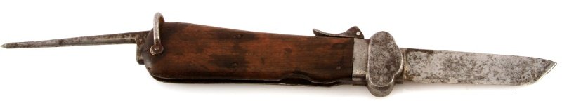 WWII THIRD REICH GERMAN PARATROOPER GRAVITY KNIFE: German World War II Luftwaffe Paratrooper Fallschirmjager Gravity Knife. Measures 9 3/4" long with the blade open. The blade measures 11/16” wide by 3 1/2" long and has been reshaped. Has a pair of 