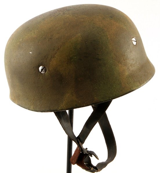 WWII LUFTWAFFE FALLSCHIRMJAGER CAMO JUMP HELMET: German World War II Luftwaffe Paratrooper Fallschirmjager Camouflage Jump Helmet. The camoflauge paint includes yellow, greens and reds. The four aluminum bolts holding the liner and chin strap in pla