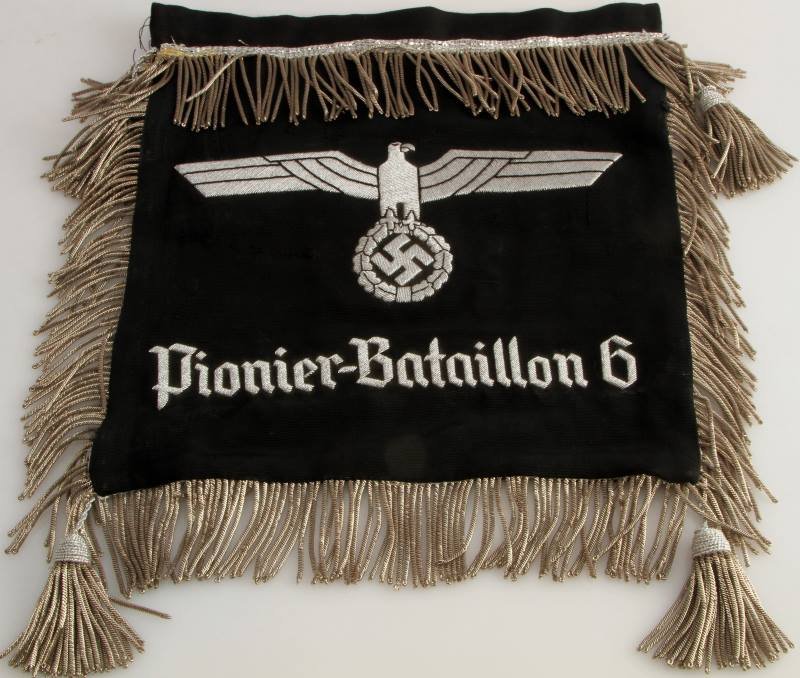 GERMAN WW2 ARMY PIONEER BATTALION 6 SCHELLE BANNER: German WW2 Army Pioneer Battalion 6 Schellenbaum Banner. Measures 14 5/8" wide by 13 1/2" tall including the silver bullion wire fringe around the edge. The front reads 'Pioneer-Battaillon 6' and has