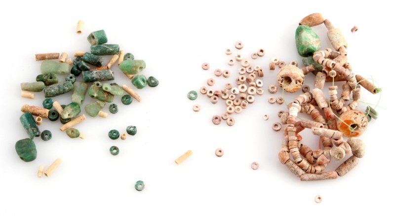 COLLECTION OF LOOSE JADE AND CLAY MAYAN BEADS: From a Old Louisiana estate recovered from the New River, Belize region prior to 1950. Includes apple green jade beads 3 to 10 mm in size and a mixed partial strand of clay , shell and jade beads. All