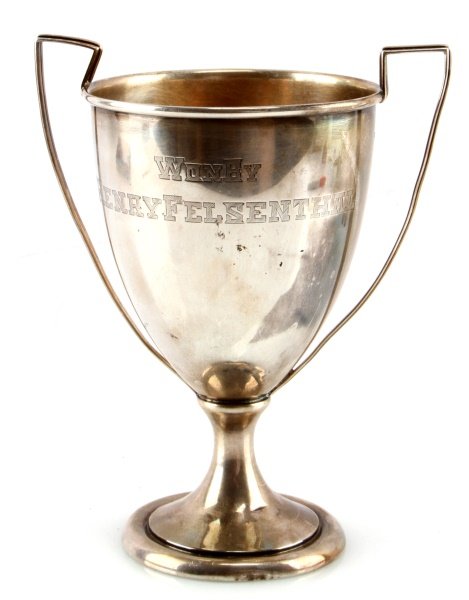 STERLING SILVER 7 INCH 233 GRAM TROPHY: Stamped sterling and named to Henry Felsenthal.