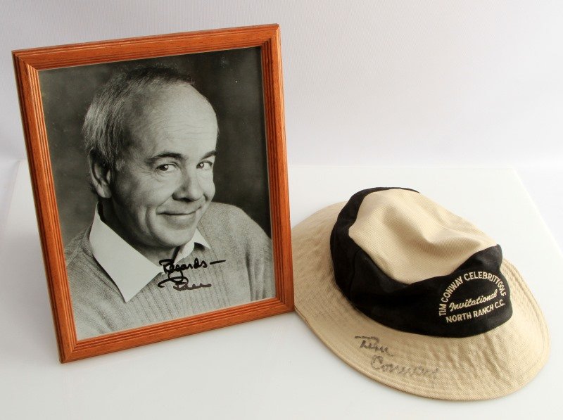 TIM CONWAY SIGNED GOLF HAT & PHOTO AG: Guarenteed Authentic Tim Conway autographed "Tim Conway Celebrity Golf Invitational" golf sun-hat & framed photo. Both items are in good vintage condition, the sun hat displaying minor staining, and t