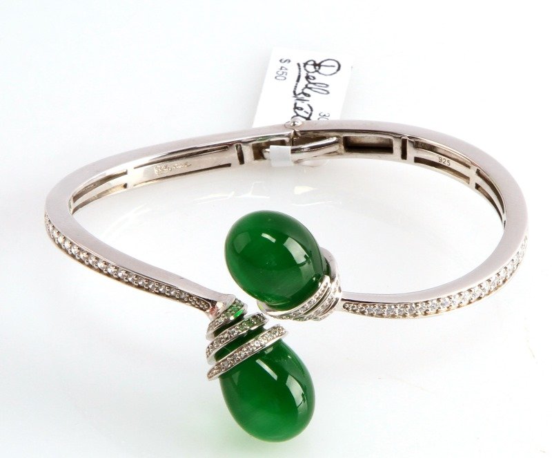LADIES STERLING BELLE ETOILE "EDEN" BRACELET: New with tags, from Belle Etoile, "Eden", sterling hinged bangle bracelet, The luminous cat’s eye stones of the Eden collection express a rich and bright look. With swirls of sterling silver graciou
