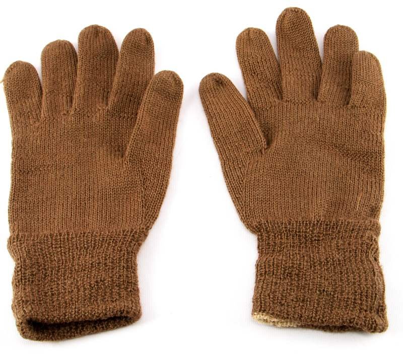 WWII THIRD REICH GERMAN RE-ENACTOR'S KNIT GLOVES: A pair of drab olive gloves as worn during the Battle of Stalingrad and other cold weather situations. Larger size. Made of knit fiber. In very good condition.This lot has a reserve.