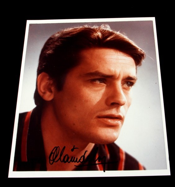 AUTOGRAPHED PHOTOGRAPH OF ALAIN DELON: Photograph is marked 'Alain Delon.". Overall in very good condition. From the Gisela Hammer Morrison autograph collection.