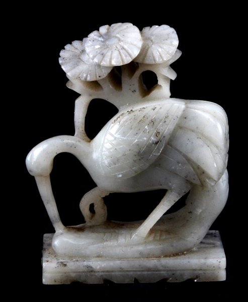 CARVED CHINESE WHITE SOAPSTONE CRANE AND FLOWERS: A white soapstone carving of a crane with some flowers. Stands 3.25 inches tall. In very good condition.