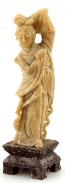 SOAPSTONE CARVING OF A DANCER WITH BASE CHINESE: Chinese soapstone carving of a dancer with small brown base attached, item measures 4 inches tall and 1 inch wide. Item is in very good condition with no signs of damage.