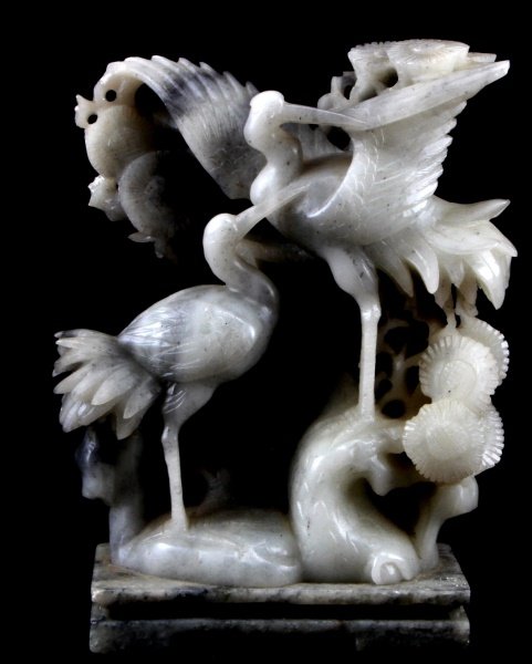 WHITE SOAPSTONE CRANE SCULPTURE 6.5" TALL CHINESE: Chinese soapstone carving in the round of two cranes with floral designs around them. Very good condition, no chips or damage. Measures 6.75 inches tall by 4.25 inches wide. No apparent maker's mark.