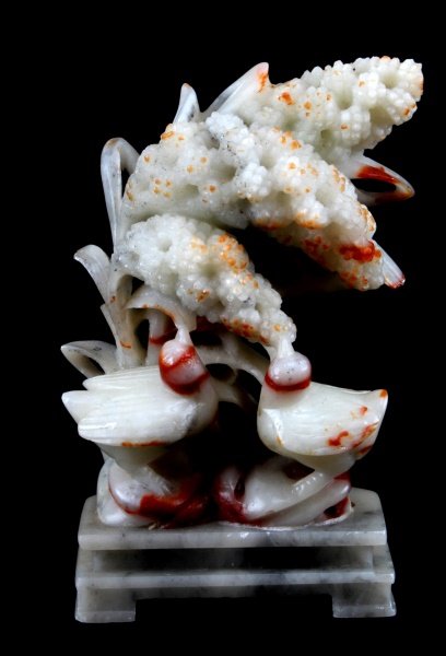 MULTICOLORED SOAPSTONE CHINESE CARVING 5.5": Multicolored soapstone carving of two birds next to vegetation. Carving in high relief. Free from damage. Measures 5.5 inches tall. The base has a made in China sticker.