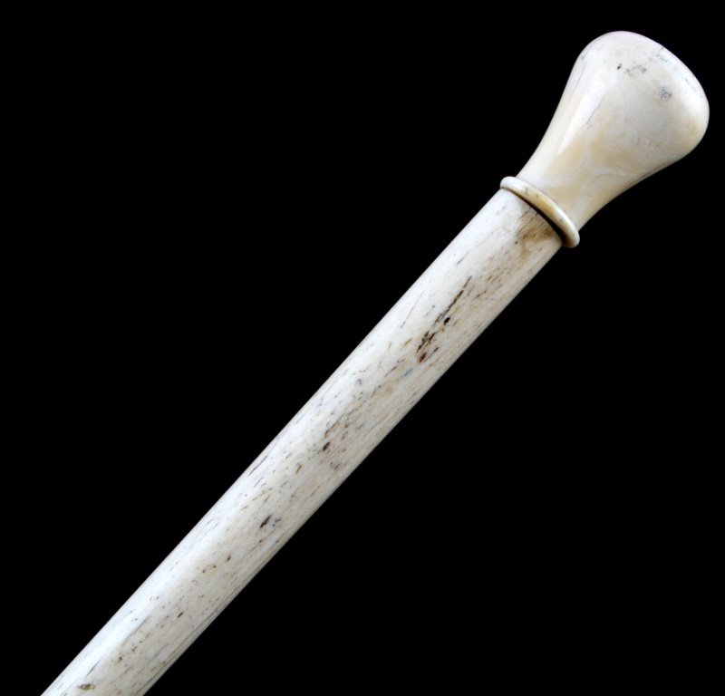 ANTIQUE WHALE BONE WALKING STICK 38 INCH: 19TH Century whale bone shaft and tooth handle of less than 200 grams weight in the handle only. Significant age patina. Very good condition. No international shipping, or New York, Connecticut, Calif