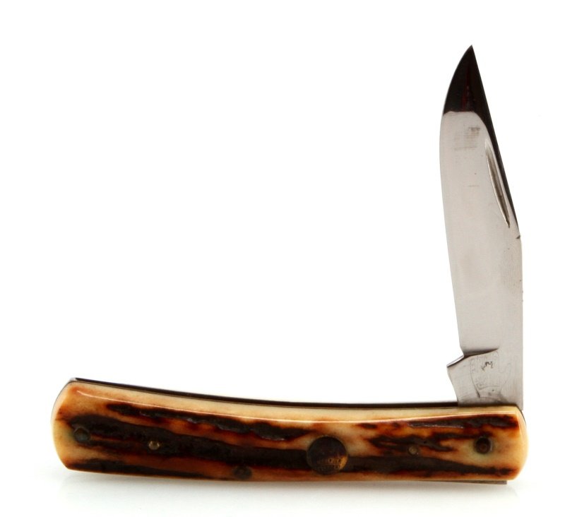 VINTAGE J.H. GLOVER STAG FOLDING POCKET KNIFE: One blade, solid construction, brass rivets, maker marked to handle and blade. Entire length is 6.5 inches.