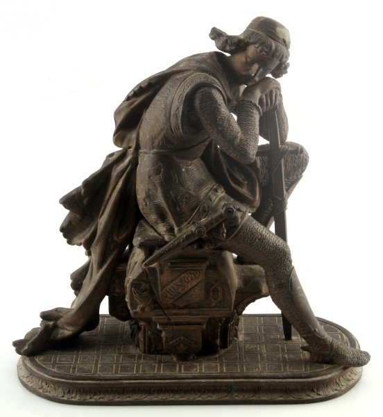 ANTIQUE KING ARTHUR BRONZE FIGURINE 10.5": Antique bronze figurine depicting King Arthur, or a knight, sitting on an ornate base. He wears chain mail, a cape, and tunic. The work is unsigned with no apparent foundry mark. The head has some dam